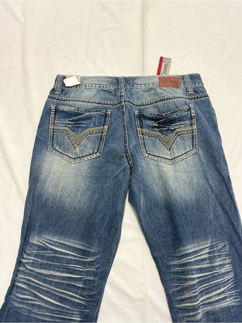 Y2K 2000s style Embroidered Axe & Crown Bootcut Jeans | $40
